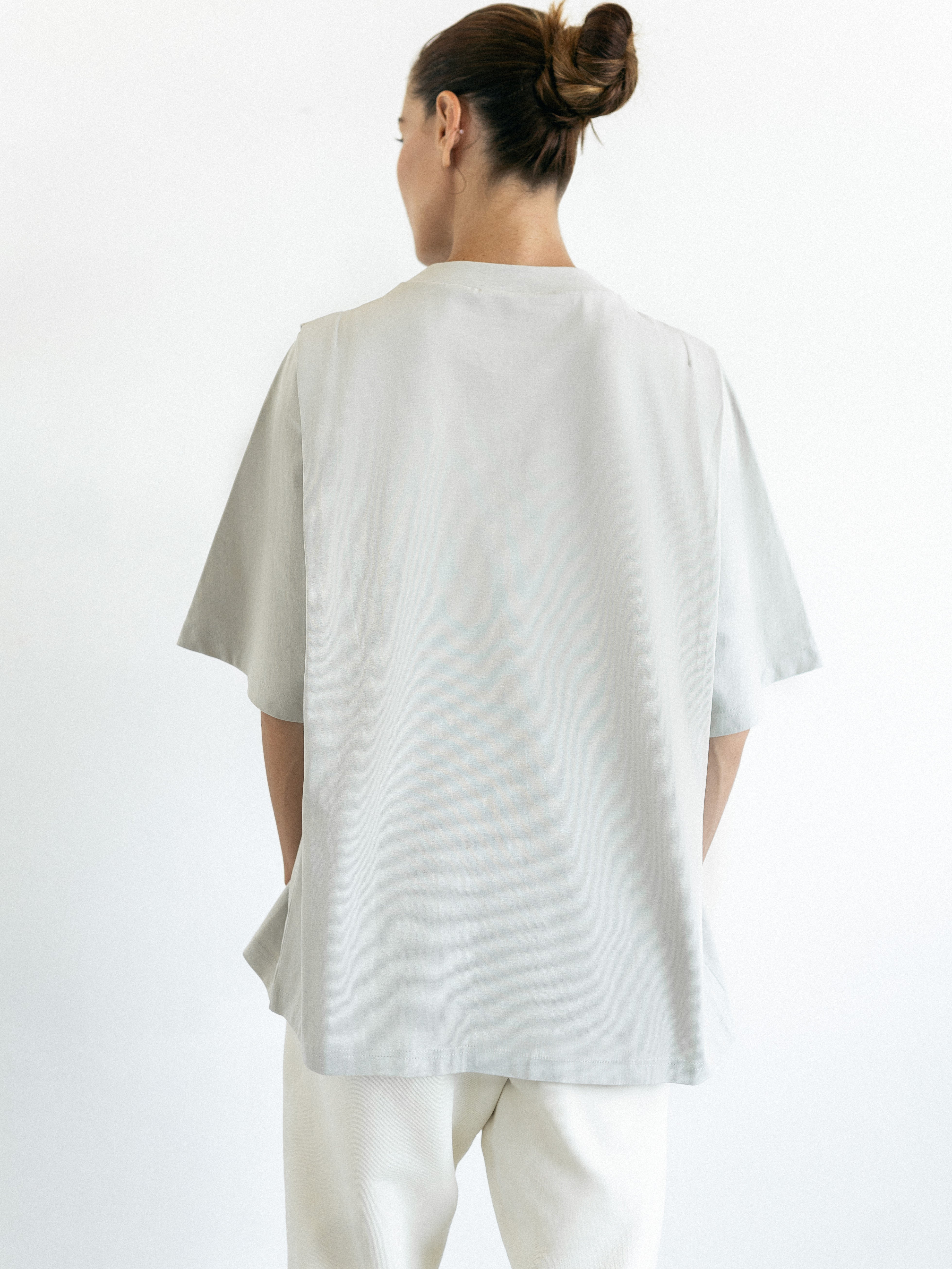 Back view of The Ultimate Tee in Dawn, showcasing a relaxed D-back design, ideal for nursing moms and moms-to-be, crafted from soft, heavyweight 100% cotton | amama.shop