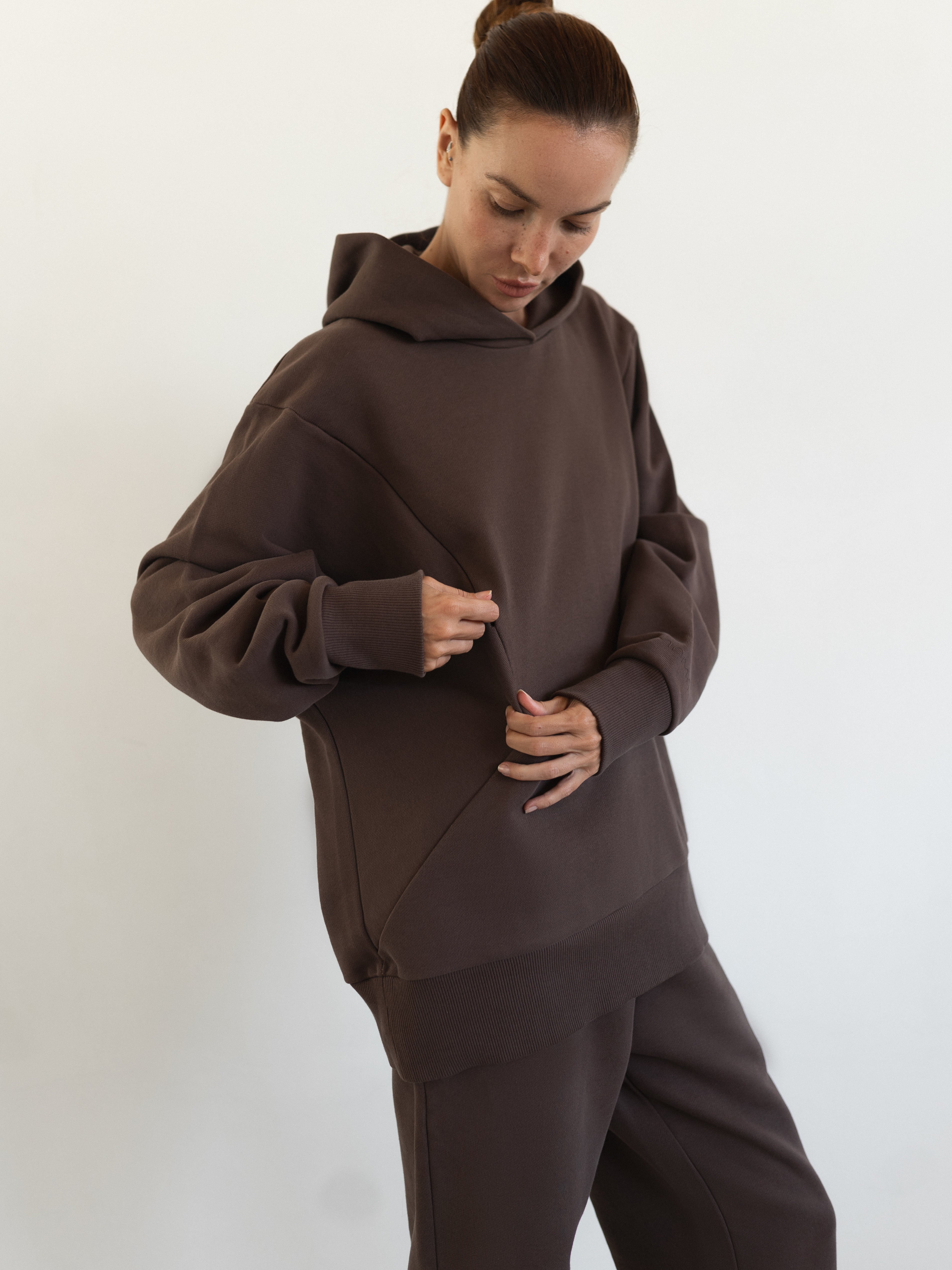 Nursing pocket of The Optimal Hoodie in Sunset Shadow, designed for breastfeeding moms | shop online | amama.shop
