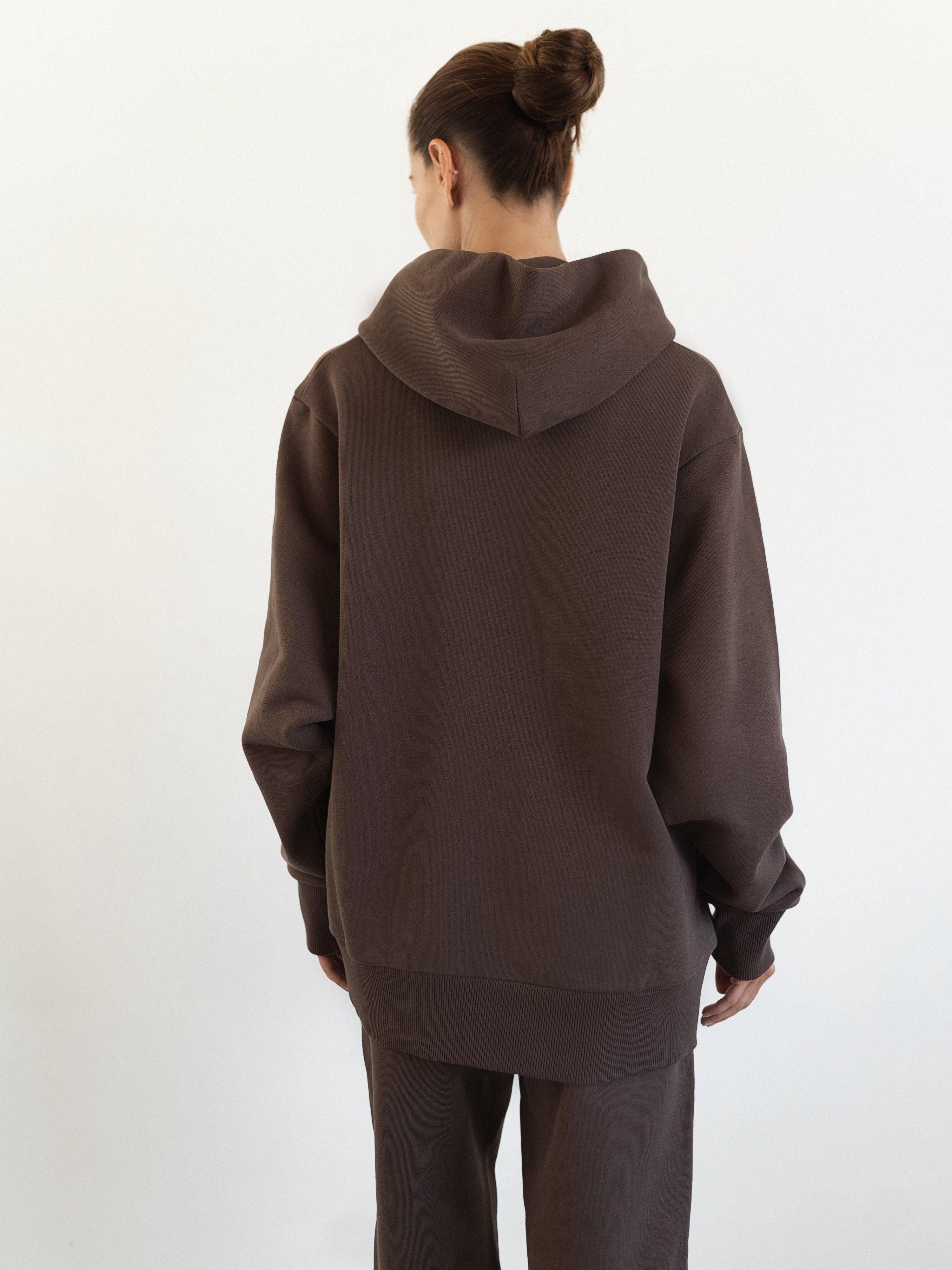 Back view of The Optimal Hoodie in Sunset Shadow, a cozy and stylish option for maternity and nursing wear